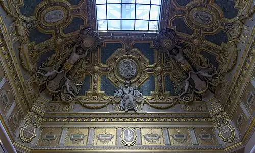 Neoclassical sculpted decoration on the ceiling of the Salon Carré, Louvre Palace, by Pierre-Charles Simart, 1851[52]