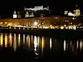 The fortress (background), Salzburg Cathedral (middle), and the Salzach (foreground)