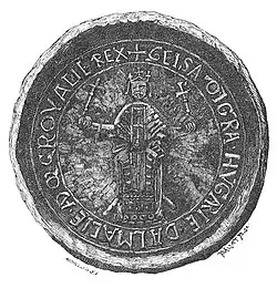 A man wearing a crown sits on the throne with a scepter and an orb in his hands