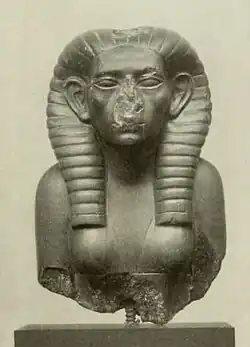Partially damaged statue of a female