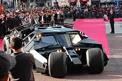 A photograph of Batman's vehicle, the Tumbler, among a crowd at the European premiere of The Dark Knight in London