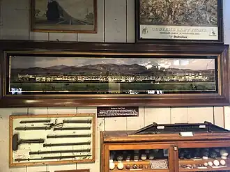 Train photo enhanced with mother of pearl. Made for display in the office of E. J. Gorman, president of the Chicago, Rock Island & Pacific RR. Now at the Western Trails Museum, Knott's Berry Farm, Buena Park, California.