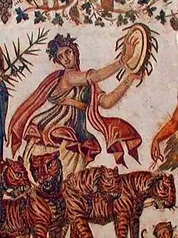 Maenad playing a tympanum. Detail from the Triumph of Dionysus, on a Roman mosaic from Tunisia (3rd century AD).