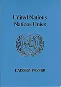 The front cover of a blue machine-readable United Nations laissez-passer