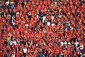 Supporters of the Vietnam national football team wearing attire that is visually inspired by the National Flag in the 2019 AFC Asian Cup