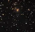 Warped and distorted around SDSS J1050+0017.[57]