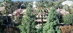 A view of the house from a highrise building to the south