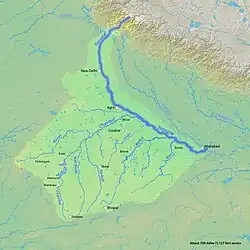 The Yamuna is the second-largest tributary river of the Ganges and the longest tributary in India. It flows almost parallel to the Ganges about its right bank for 1,376 kilometres (855 mi) before merging with it at the Triveni Sangam, Allahabad.