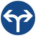 Sign 214-30 Turn left or right ahead