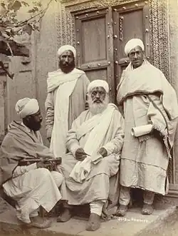 Kashmiri Pandits in phiran and pyjama