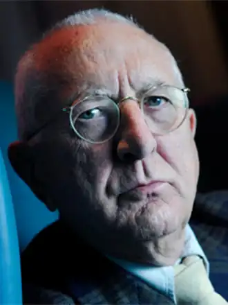 Headshot of Len Deighton, looking at the camera