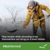 A man bundled up shoveling snow. Take breaks while shoveling snow. Overexertion can bring on a heart attack. #BeInformed